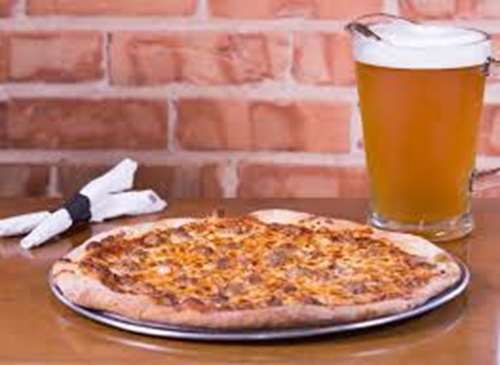 pizza and pitcher of beer