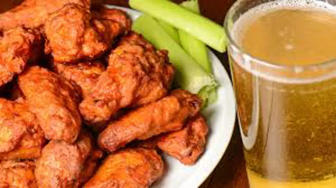 chicken wings and pint of beer